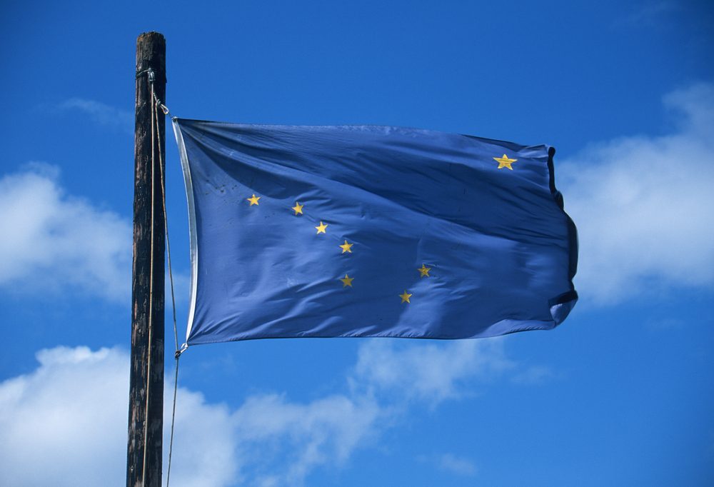 State Flag of Alaska against the sky