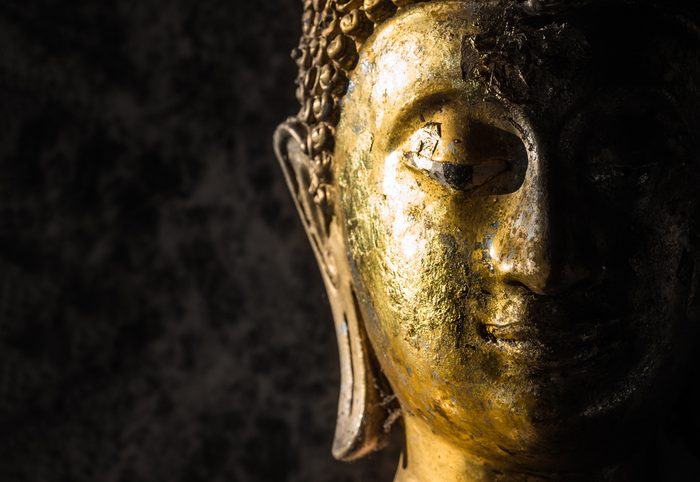 Face of statue Buddha close up at Wat Phra That Doi Suthep is a Theravada wat in Chiang Mai Province, Thailand. The temple is often referred to as Doi Suthep