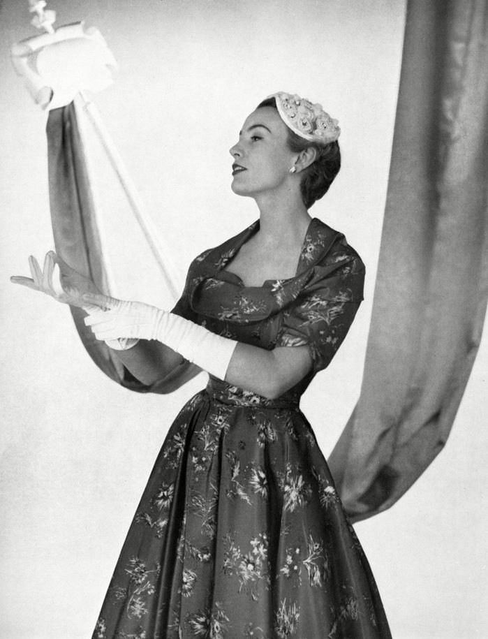 Historical Collection 84 A Charming Afternoon Ensemble 'For A Woman with A Narrow Budget' A Dress of Printed Rayon Taffeta with A Pretty Cowl Collar and Wide Spreading Skirt Over A Net Petticoat Only Costing 12 Guineas the Little Lace Straw Cap is Priced at ú4 18s 6d One of A Quartette of Outfits From Marshall and Snelgrove Showcased in the Tatler As Being Ideal For the Coronation Summer of 1953 1953