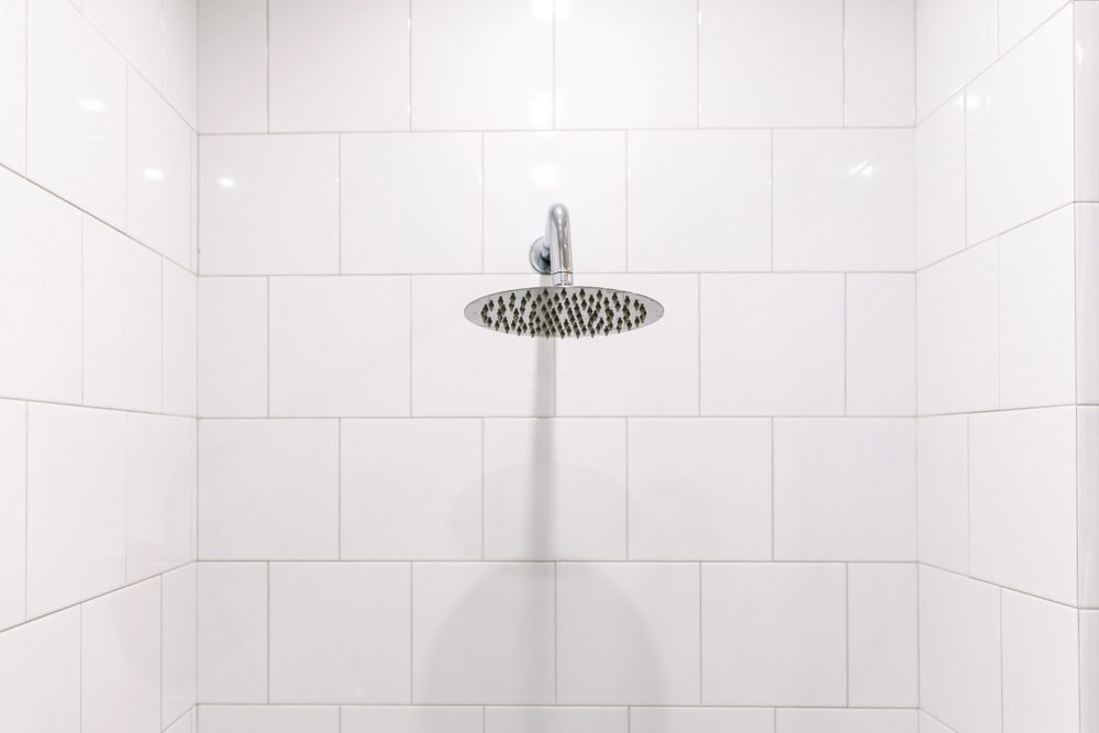 Chrome clean shower head in the bathroom