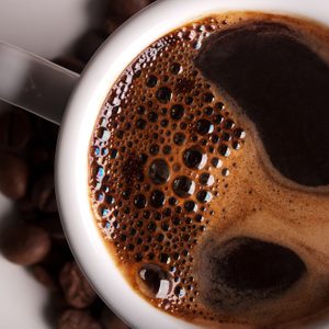 white coffee cup on background