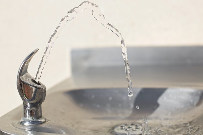 Water streaming from drinking fountain