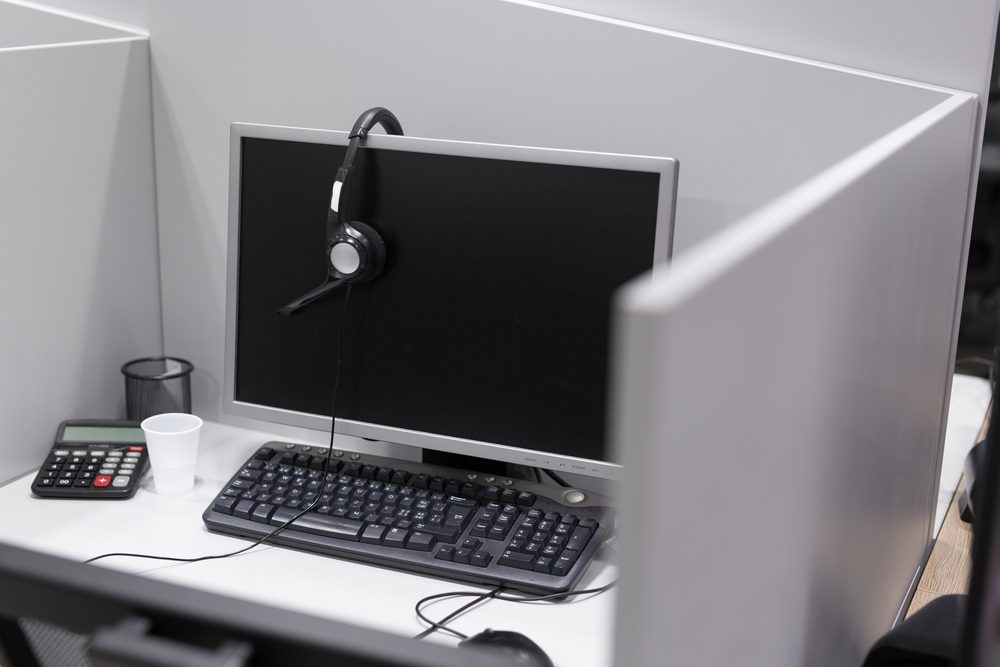 Computer and headset in empty call center office