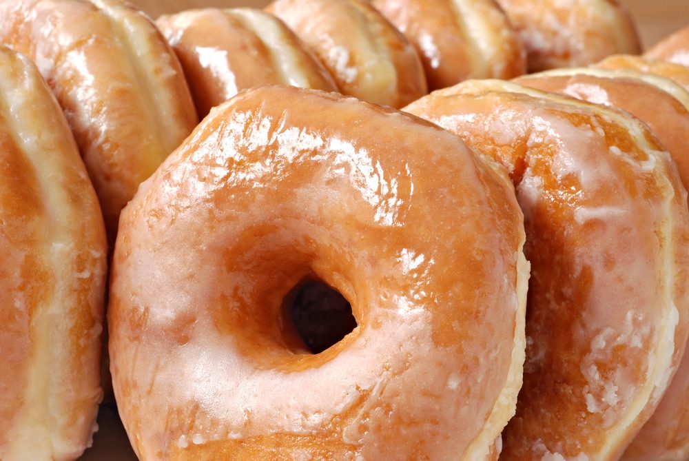 Glazed donut background image. Macro with shallow dof.