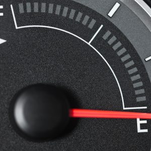 Fuel gauge with needle pointing to empty