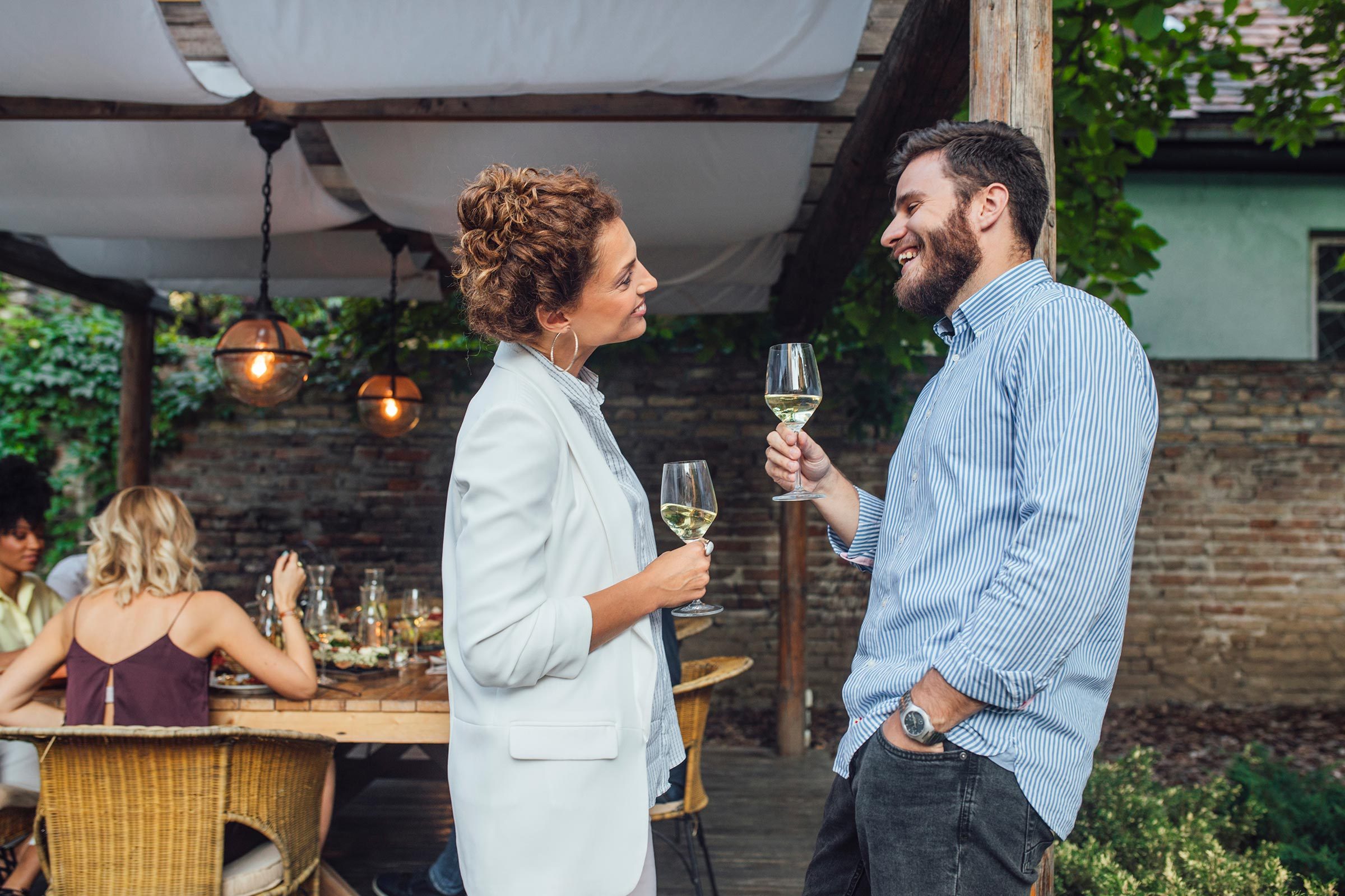 friends couple talk party wine