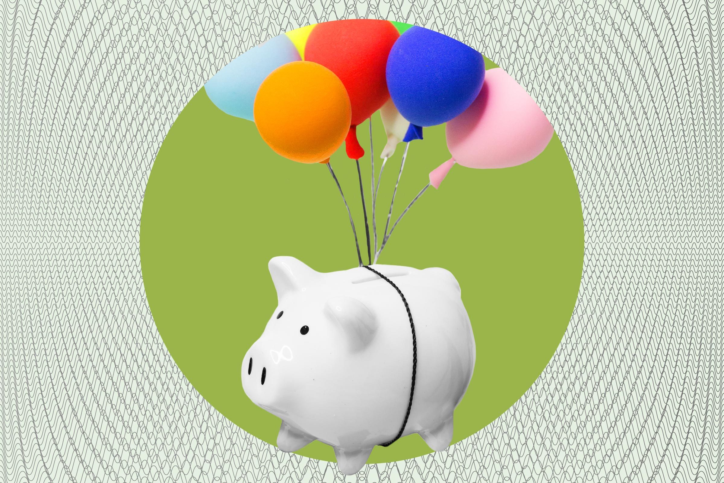 balloons lifting a piggy bank