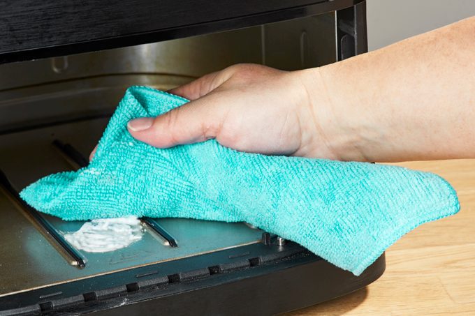 wiping the interior of an air fryer