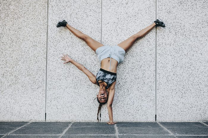 girl handstand wall