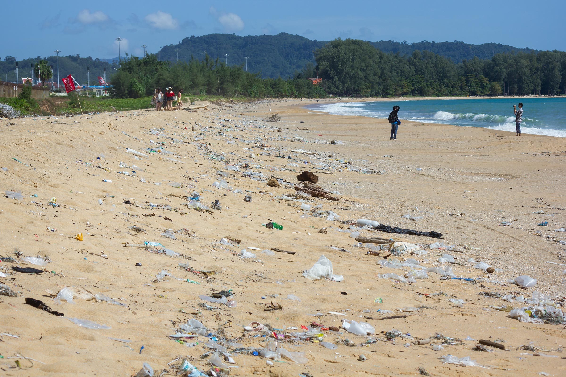 Mai Khao Beach, Phuket, Thailand - June 22,2018 : Dirty beach along the shoreline