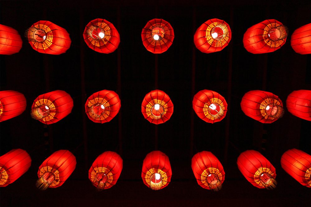 Many red chinese lanterns from below