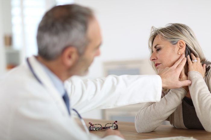 Senior woman feeling neck pain