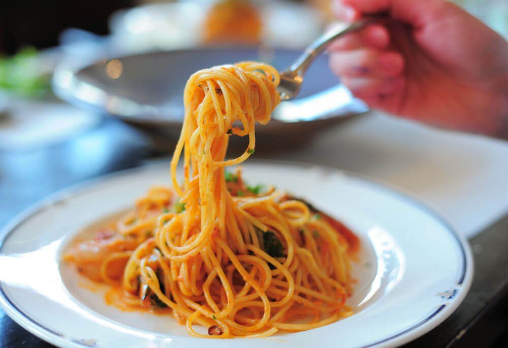 Spaghetti with tomato sauce close up