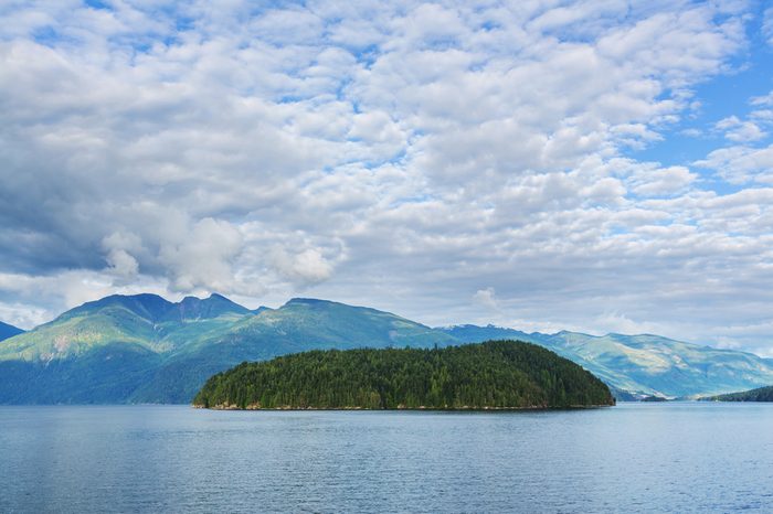 Beautiful seascape along Pacific coast of British Columbia, Canada, with rocky shoreline.