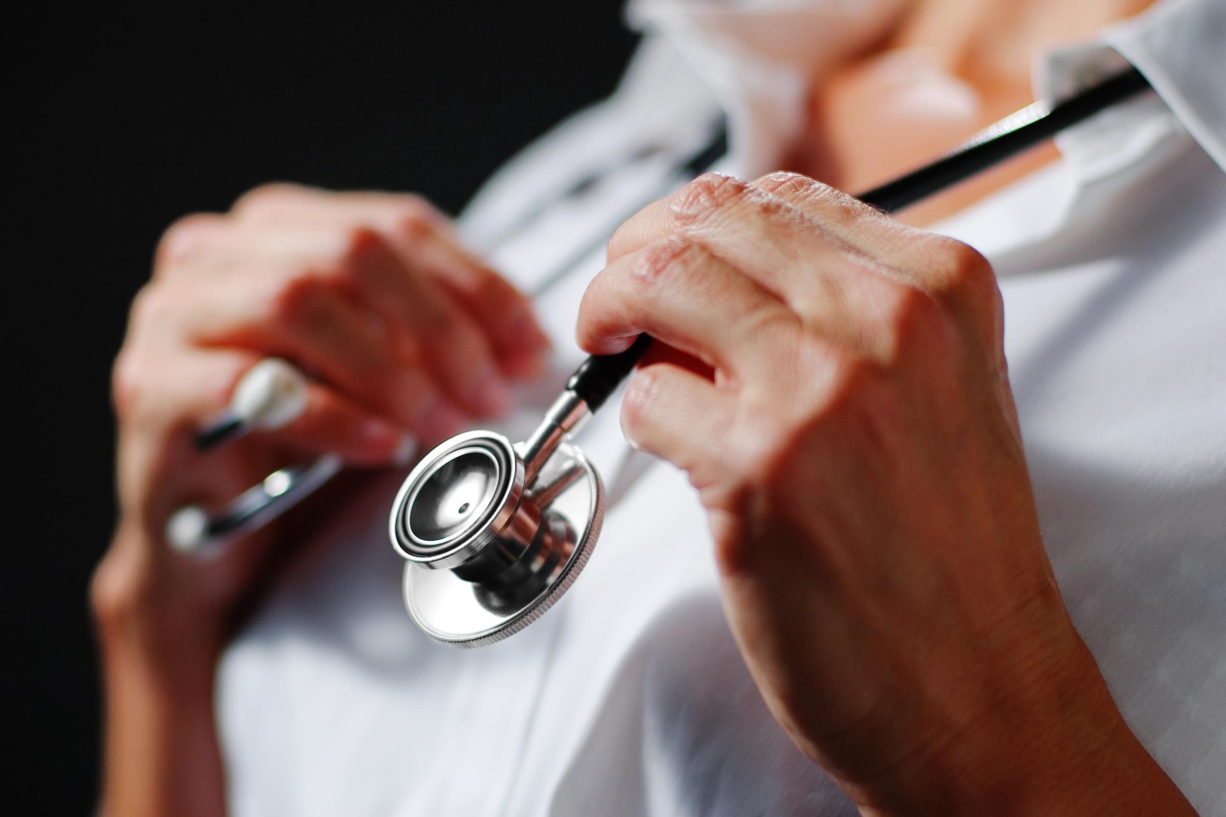 doctor stethoscope hands