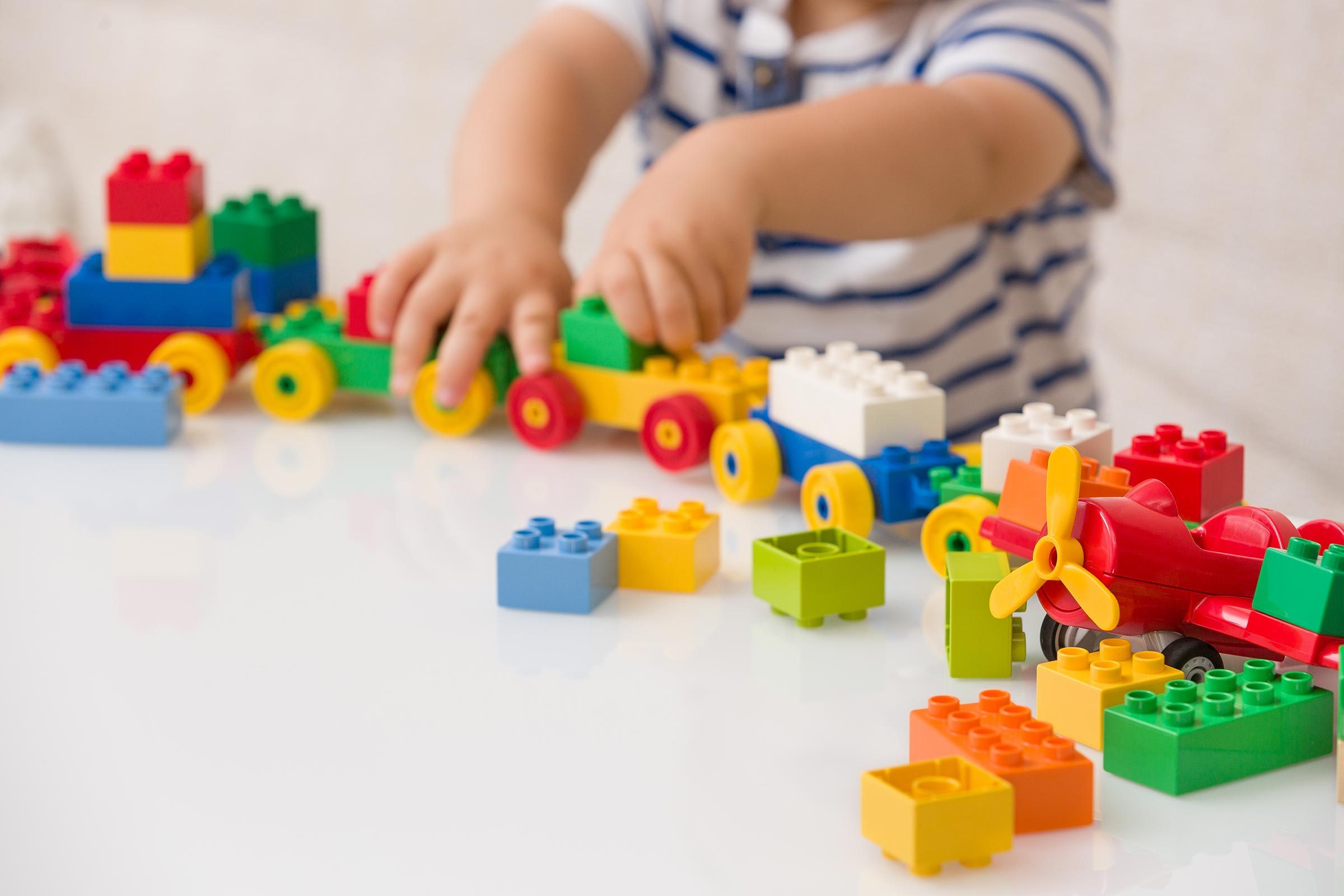 child playing with toys