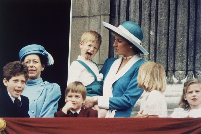 Britain's Prince Harry sticks out his tongue for the cameras on the balcony of Buckingham Palace