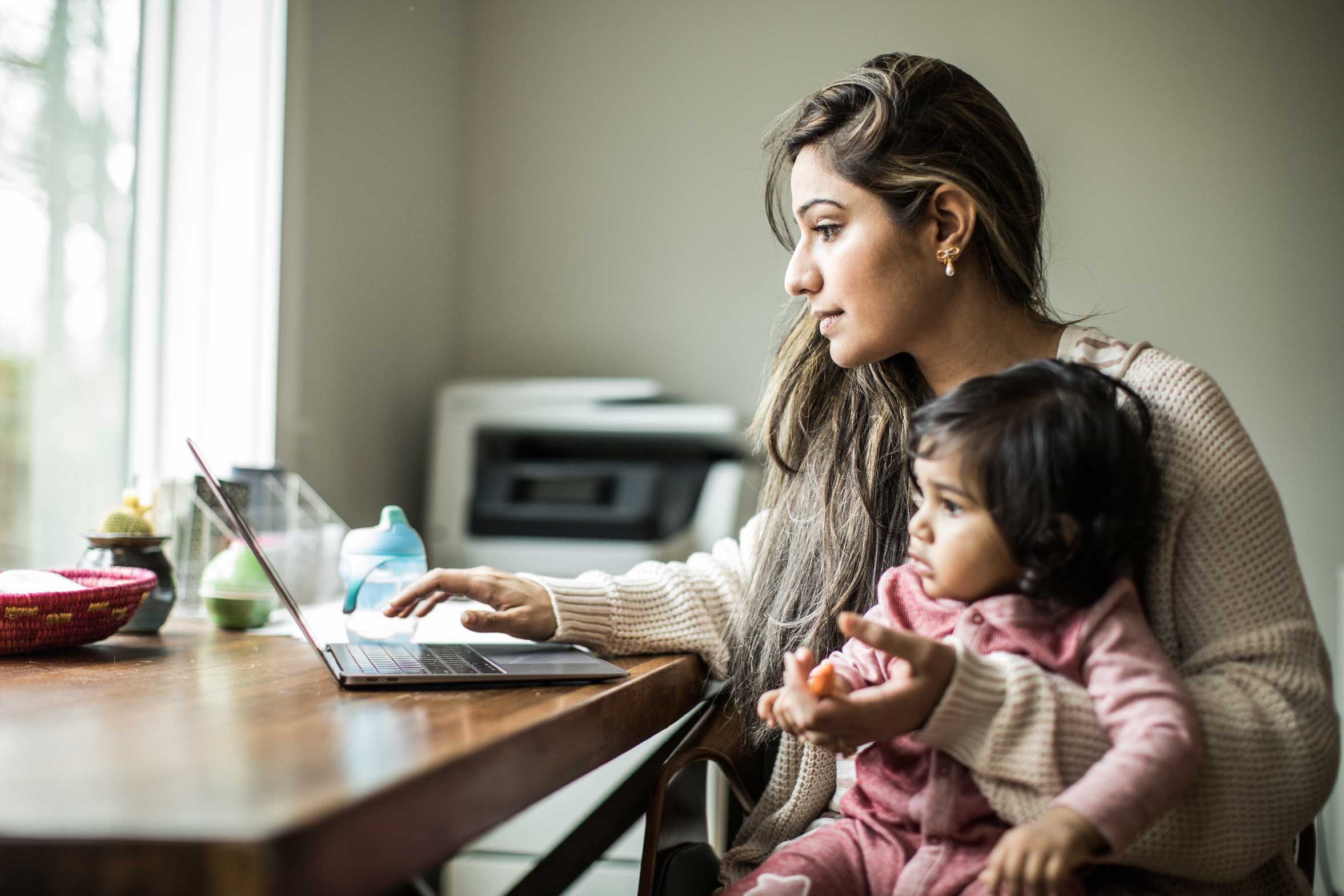 Woman and child on computer