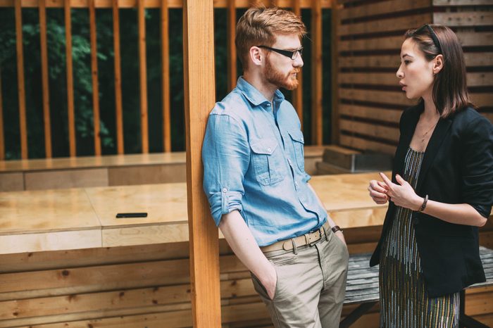 Man and woman talking. Discussion business ideas.