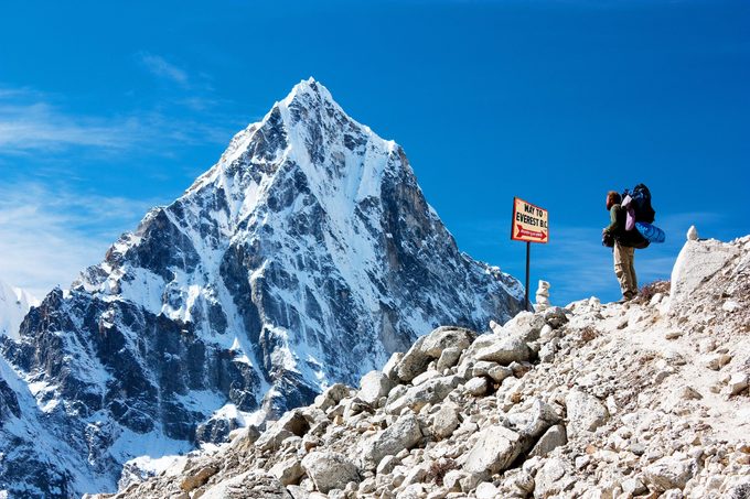 signpost way to mount everest b.c., Khumbu glacier and man, Nepal Himalayas mountains