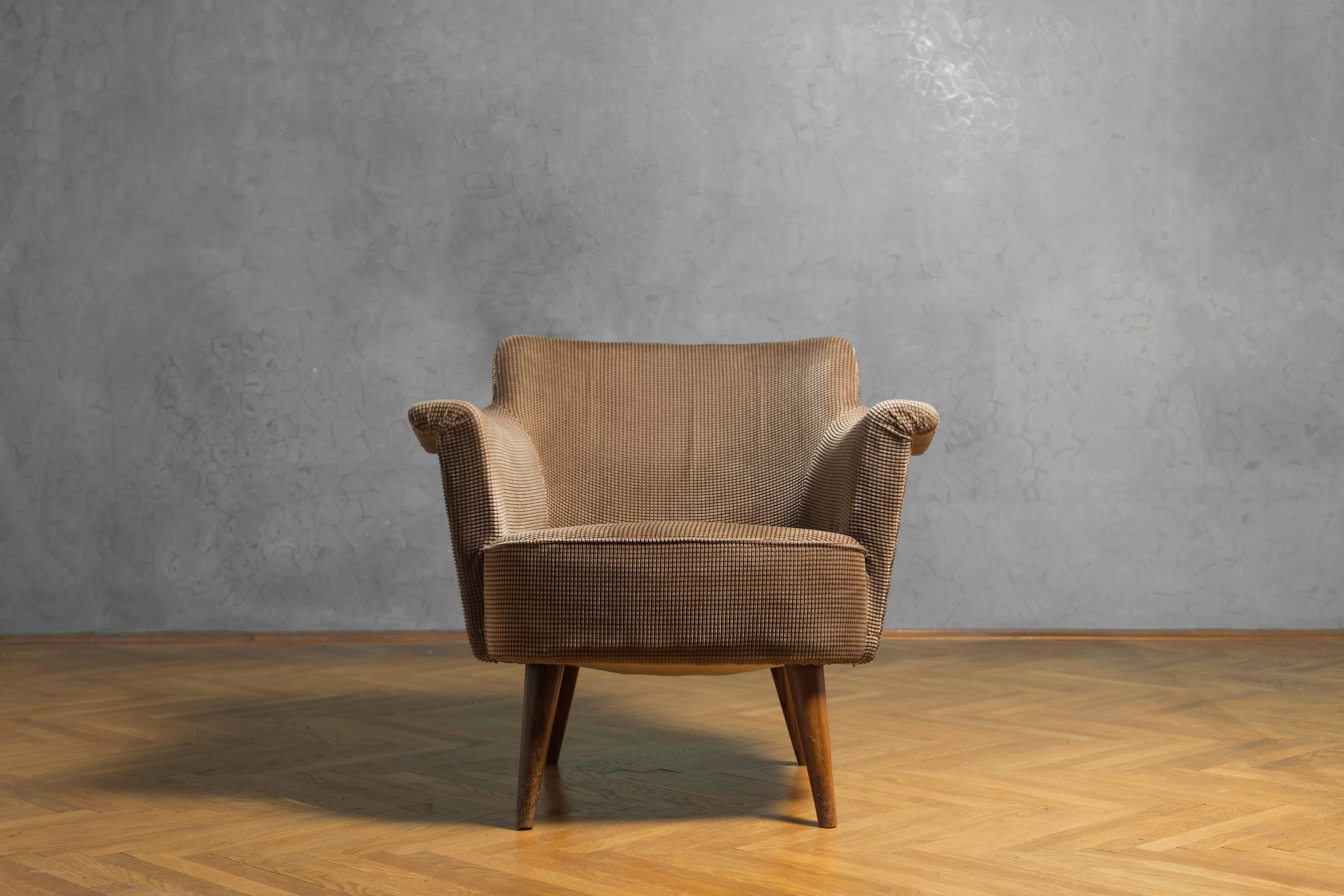 Old chair in grunge room with green wall