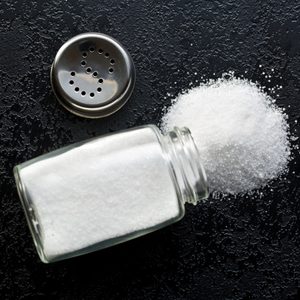 salt shaker on black kitchen table