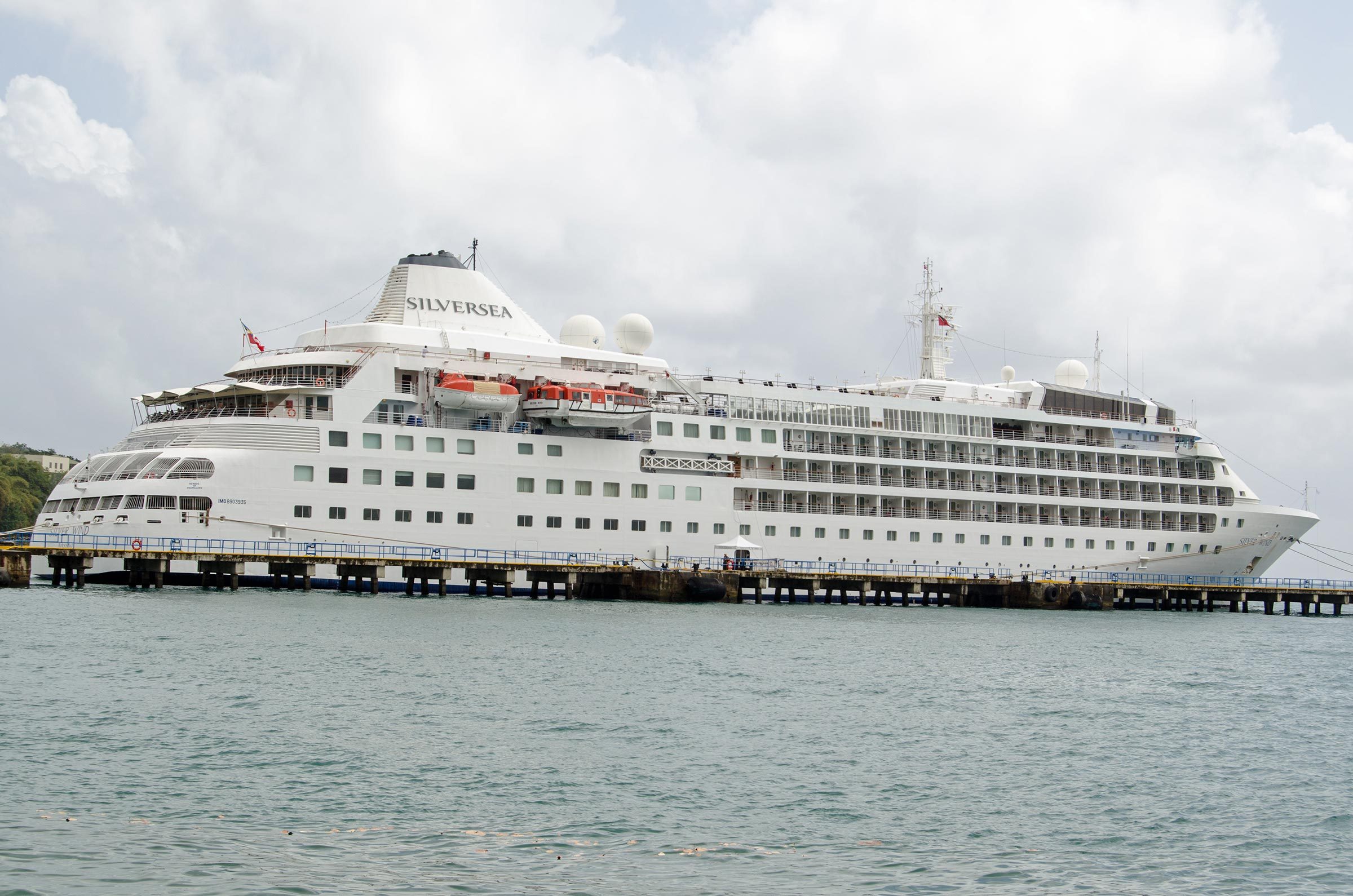 SCARBOROUGH, TRINIDAD AND TOBAGO - JANUARY 11, 2019: The cruise ship Silver Wind docked in the deep water harbour of Scarborough on the island of Tobago. Part of the Silversea line of ships.