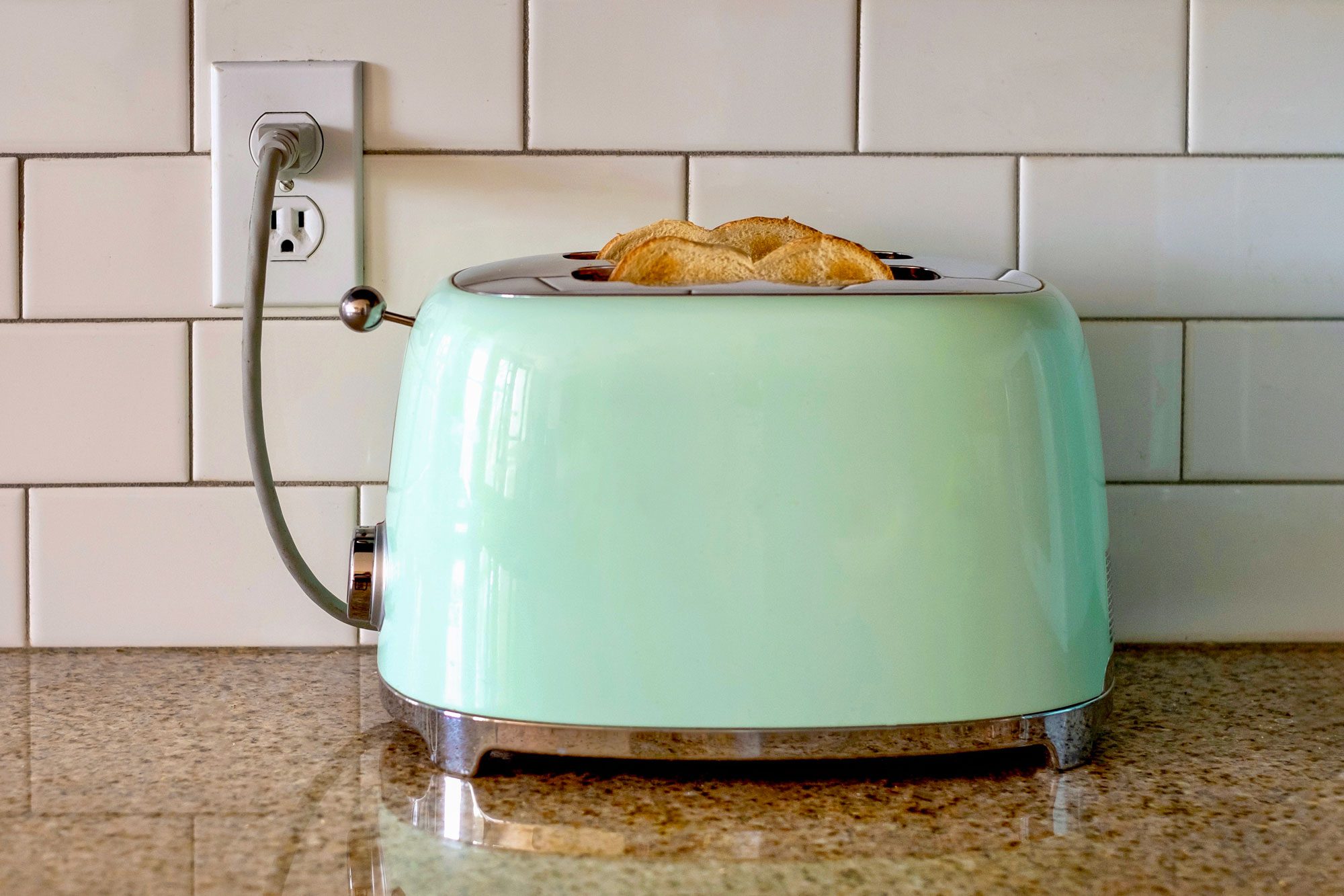Toaster Plugged Into An Outlet
