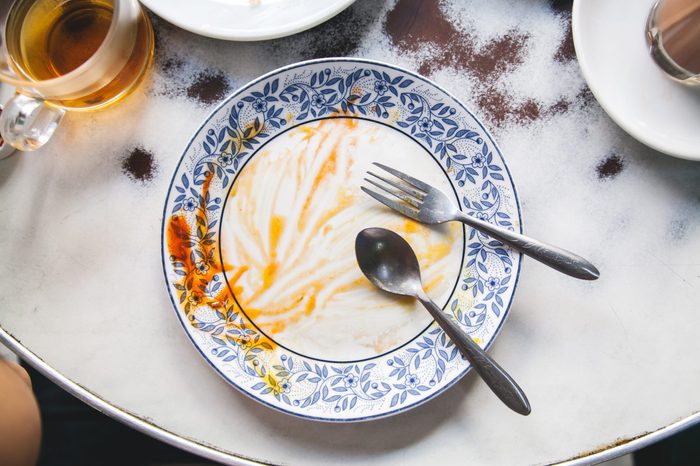 Finished Plate of English - Thai - American Breakfast on the old table.