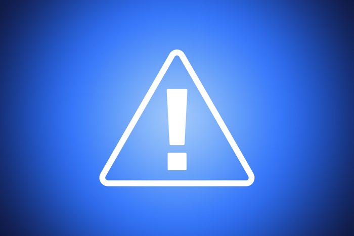 alert icon on blue background