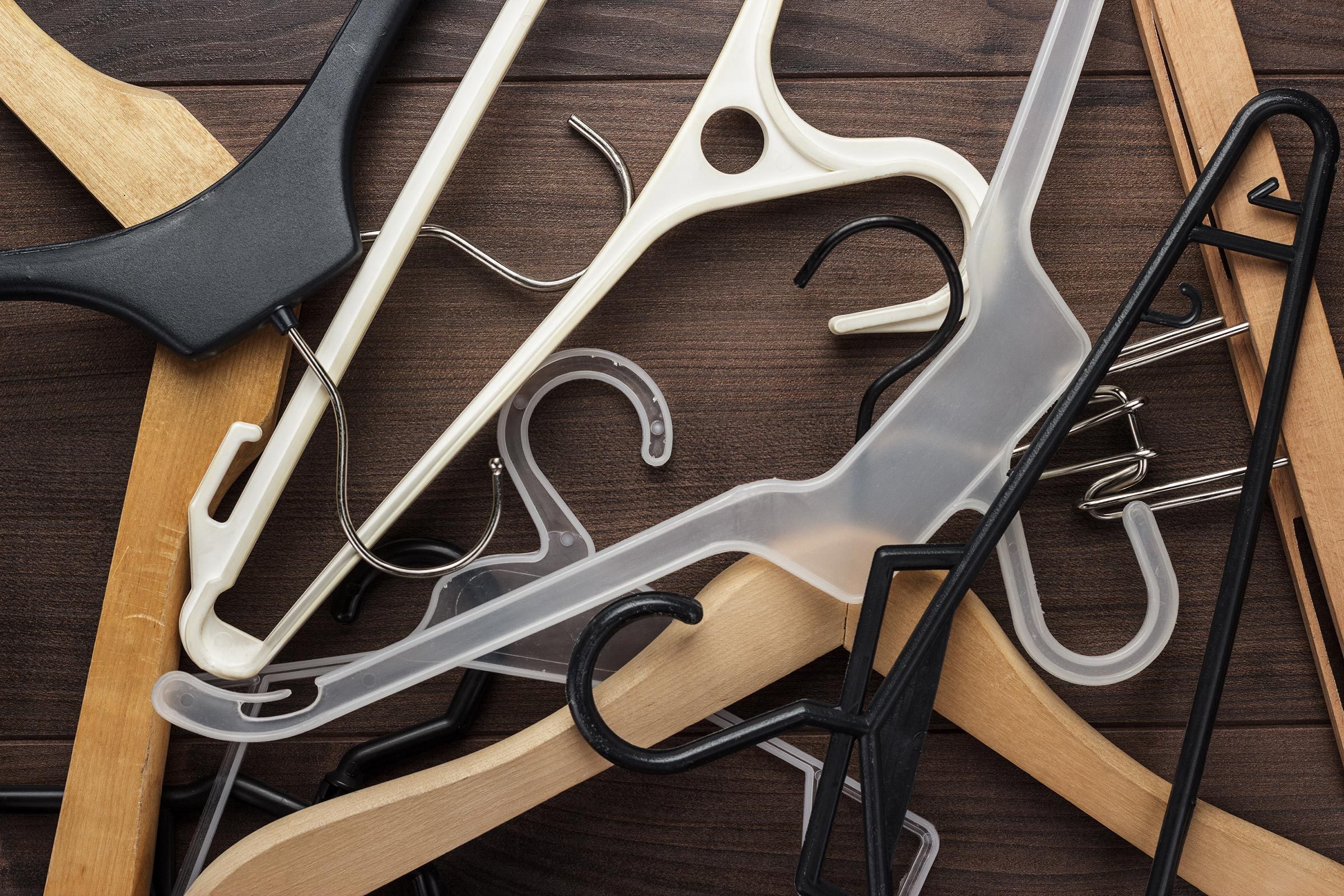 clothing hanger on the brown wooden table