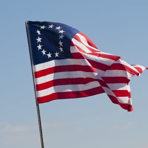 Original flag of the United States depicted by Betsy Ross.