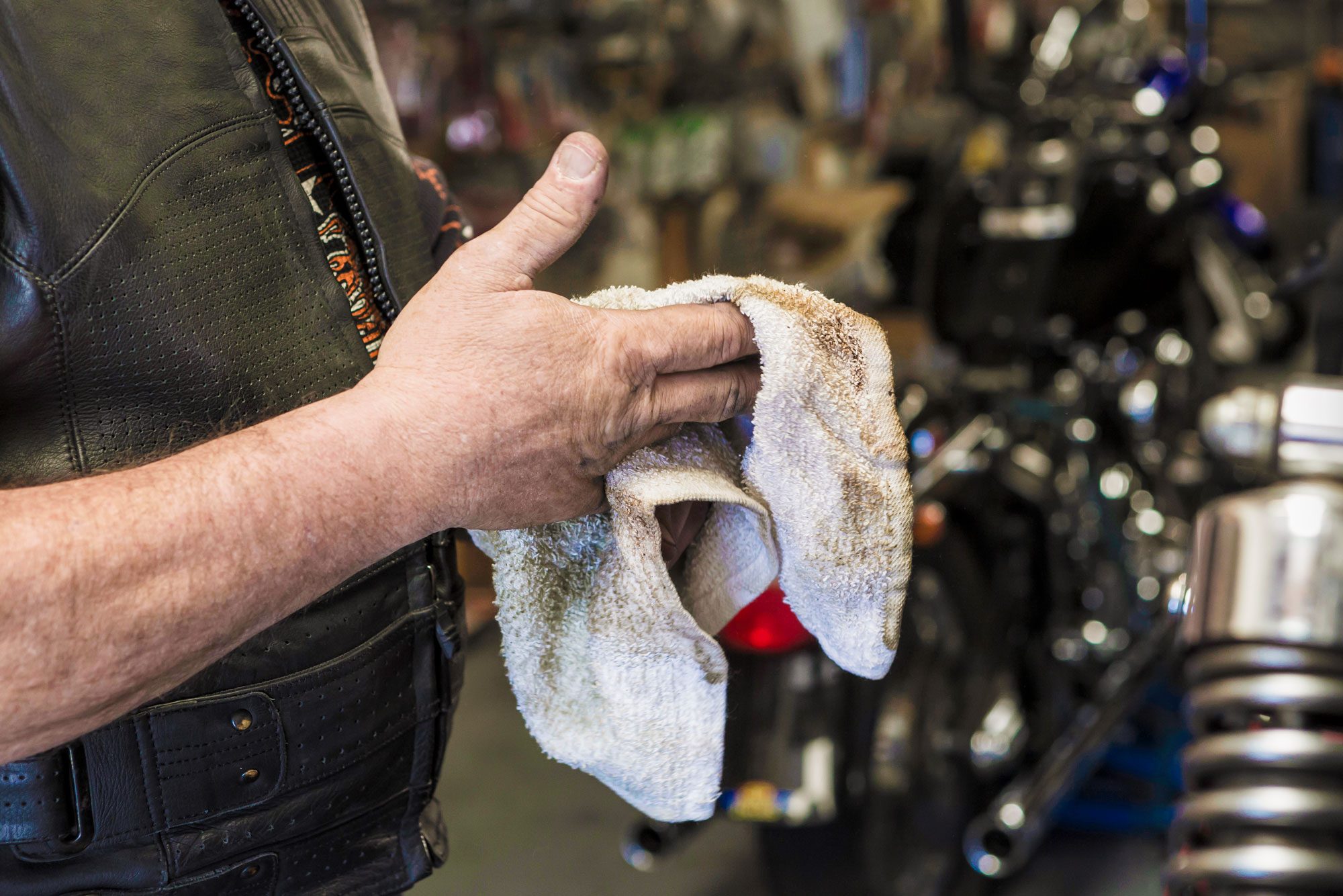 Wiping Hands With Oily Rag