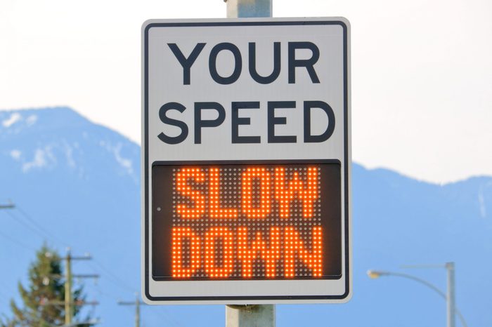 Close on an electronic sign that displays a message to slow down when the motorist or driver is traveling an unlawful speed.