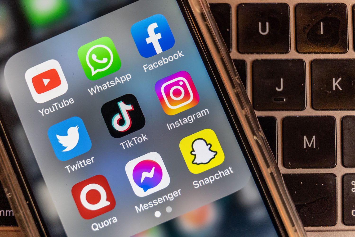 TikTok is displayed on a smartphone screen alongside that of that of YouTube, Whatsapp, Facebook, Twitter, Instagram, Quora, Facebook Messenger and Snapchat 