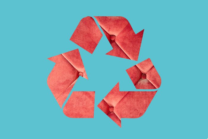 couch in a recycle symbol on a blue background