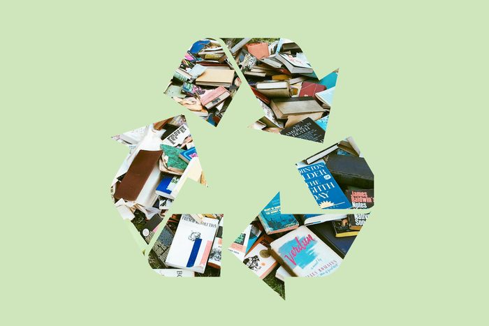 old books in a recycle symbol on a green background