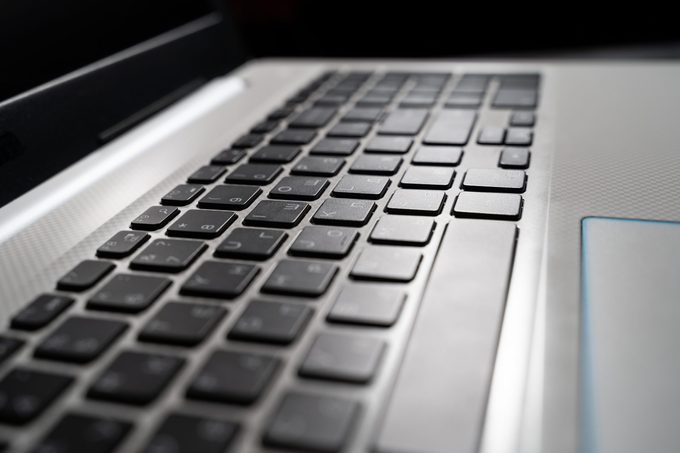 Laptop keyboard closeup. top view