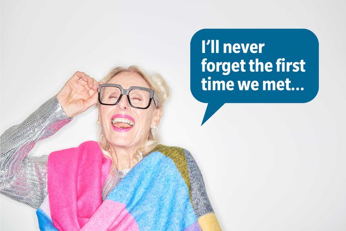 Laughing woman delivering a comeback roast, speech bubble text: "I'll never forget the first time we met..."