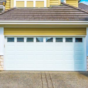 Garage, garage doors and driveway.