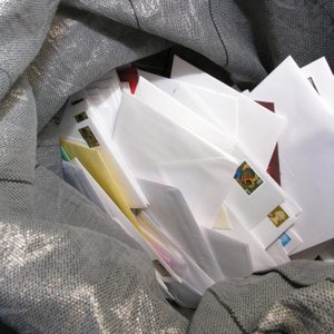 stack of mail in bag