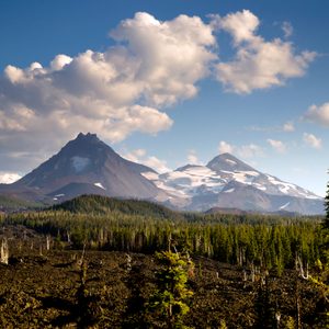 A seemingly endless field of lava leads out to the Sisters near Bend Oregon