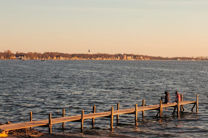 Clear Lake Iowa, Two kids sitting on dock