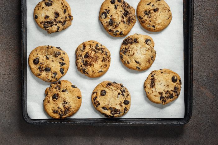 Homemade chocolate cookies on baking tray top view