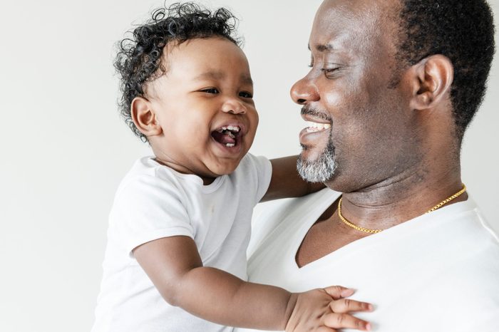 Cheerful dad and his baby