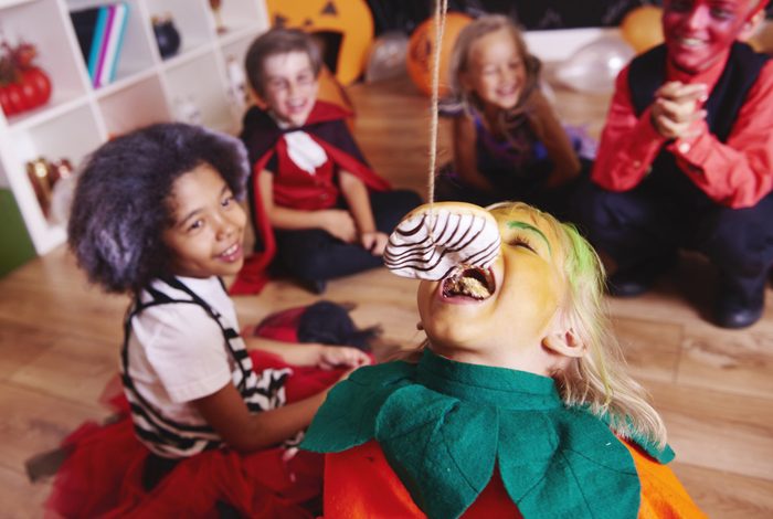 Children enjoying at halloween party