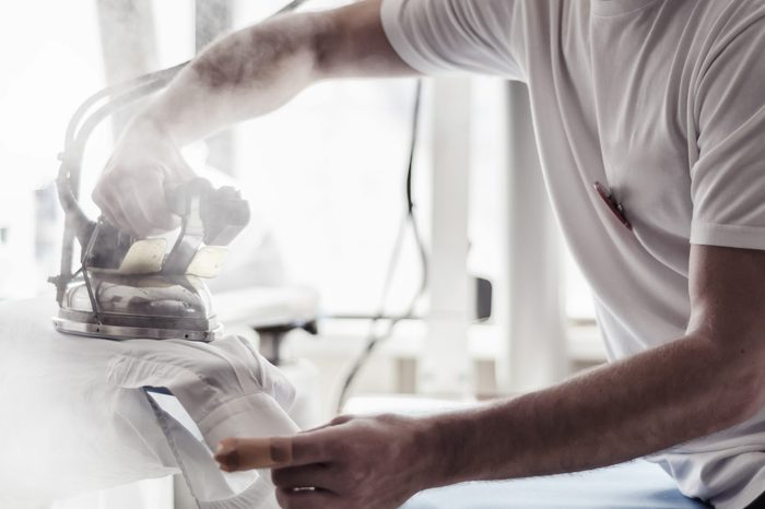 hand ironing in store or fabric