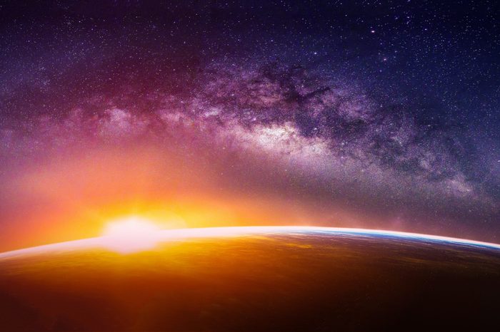 Landscape with Milky way galaxy. Sunrise and Earth view from space with Milky way galaxy. (Elements of this image furnished by NASA)