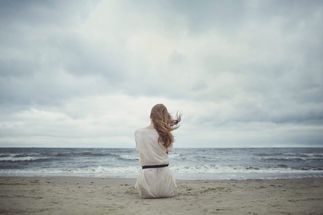 beautiful alone sensual girl on the beach