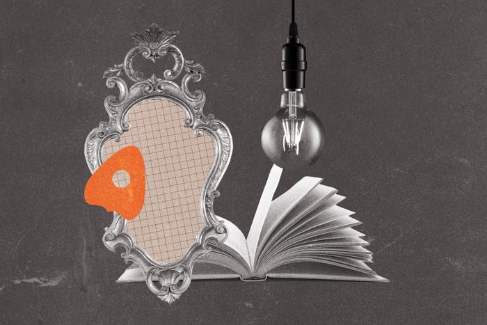 Planchette collaged with open book, antique mirror and lightbulb